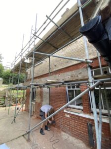 Wall tie replacement works underway to the rear elevation of a property in Hythe
