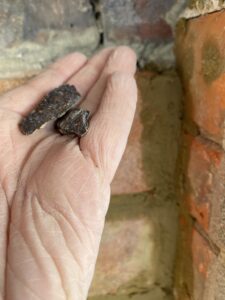 Fragments of heavily corroded wall tie removed from a property in Hythe, Kent